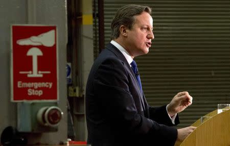 Britain's Prime Minister David Cameron delivers a speech at JCB World Headquarters in Rocester, central England in this November 28, 2014 file photo. REUTERS/Oli Scarff/Pool/Files