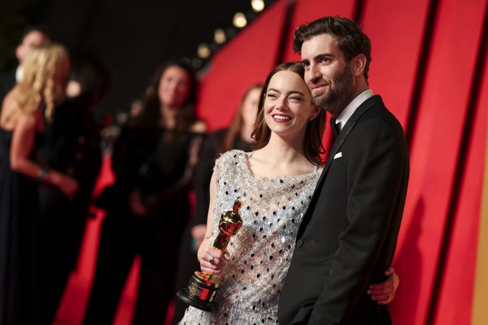 emma stone and dave mccary at 2024 vanity fair oscar party