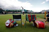 The gear of USA's Venus (L) and Serena Williams is seen on Court 18 during their doubles match against Belgium's Elise Mertens and An-Sophie Mestach at the Wimbledon Tennis Championships in London, Britain July 2, 2016. REUTERS/Stefan Wermuth