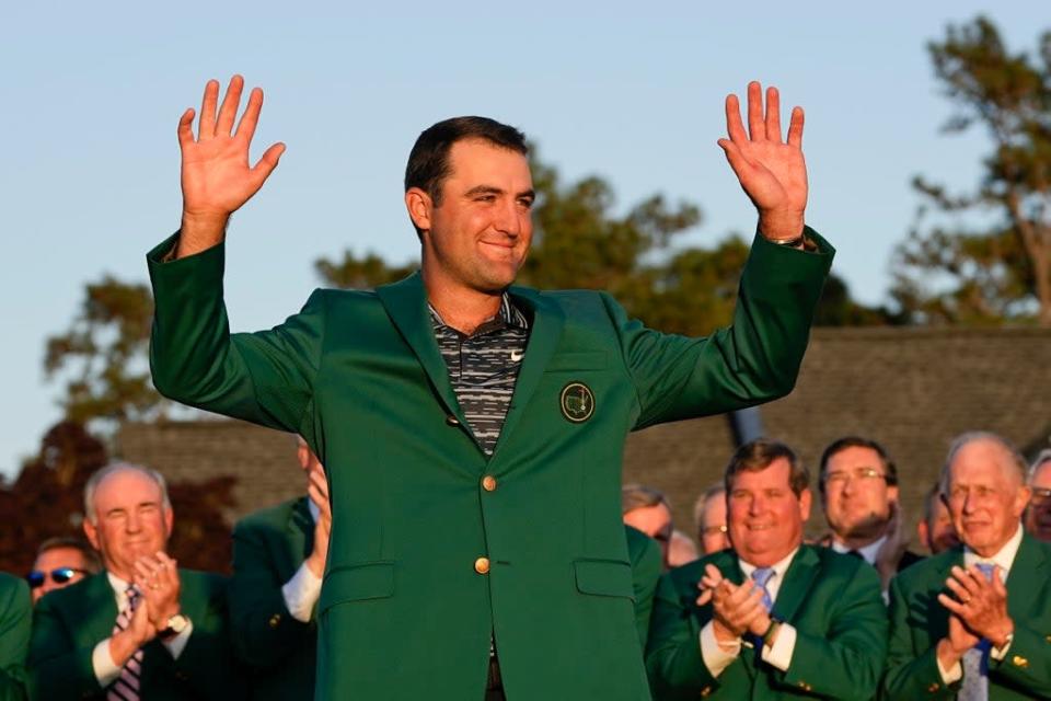 Scottie Scheffler celebrates with the Green Jacket at Augusta  (Copyright 2022 The Associated Press. All rights reserved)