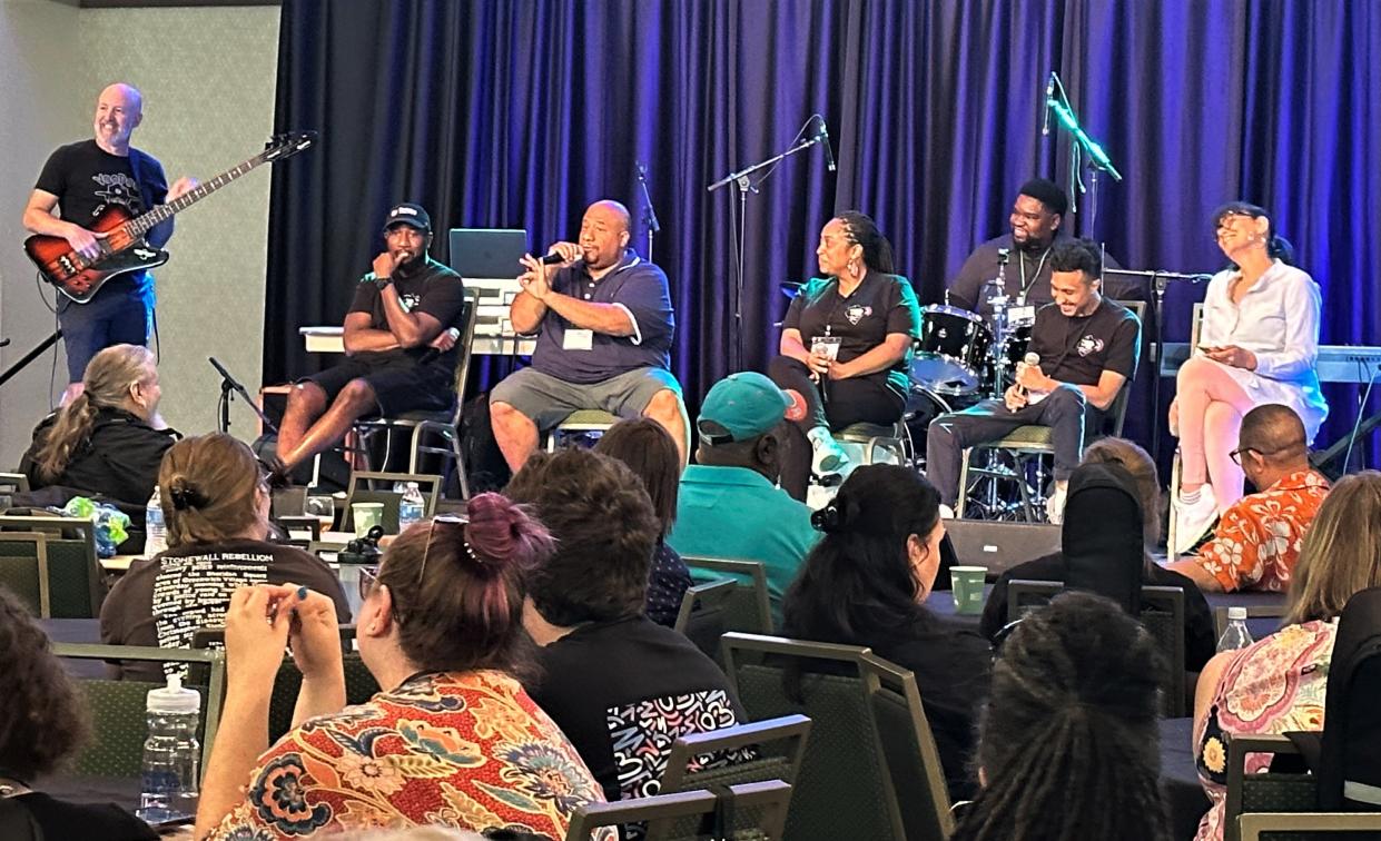 Jason Rawls, a music producer and educator, speaks alongside others involved in hip-hop at a roundtable discussion Thursday during the 11th annual Modern Band Summit at Colorado State University's Lory Student Center Grand Ballroom in Fort Collins.