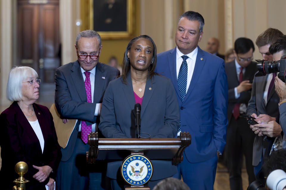 Sen. Laphonza Butler, D-Calif., joined by, from left, Sen. Patty Murray, D-Wash., Senate Majority Leader Chuck Schumer, D-N.Y.,and Sen. Alex Padilla, D-Calif., speak to reporters about the legacy of the late Sen. Dianne Feinstein, at the Capitol in Washington, Wednesday, Oct. 4, 2023. Sen. Butler was appointed by California Gov. Gavin Newsom to fills Feinstein's seat in the Senate. (AP Photo/J. Scott Applewhite)