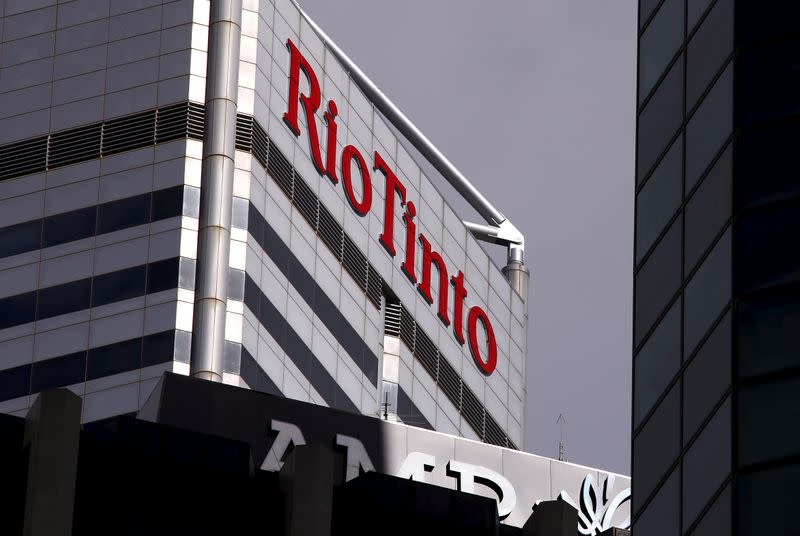 FILE PHOTO: A sign adorns the building where mining company Rio Tinto has their office in Perth, Western Australia