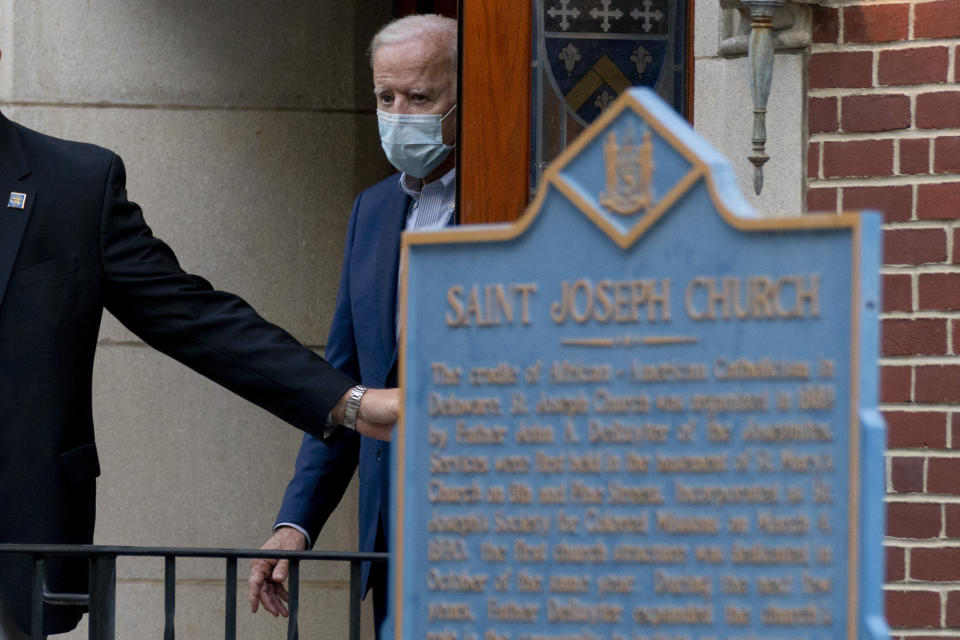 FILE - In this Oct. 3, 2020, file photo Democratic presidential candidate former Vice President Joe Biden leaves St. Joseph Catholic Church in Wilmington, Del. A Biden transition team official refused to say which church Biden might attend in the nation's capital or whether he might return to Delaware for services, at least to start. (AP Photo/Andrew Harnik, File)