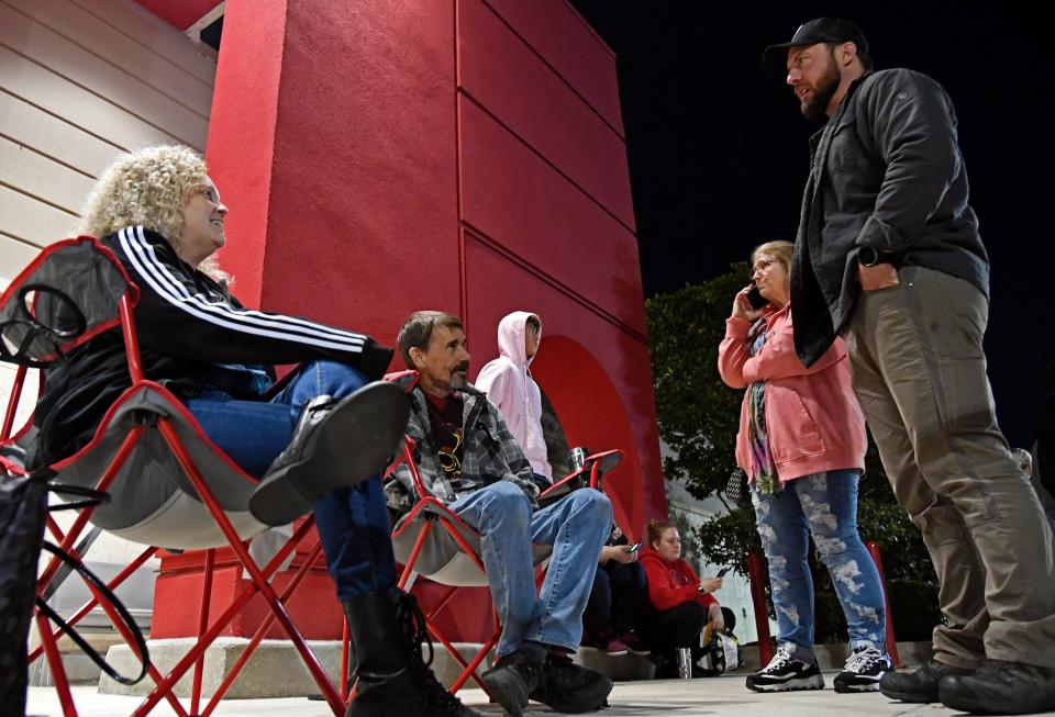 Black Friday's early morning shoppers, left to right, Sherri Moon-Trempe, Bill Trempe of Palm Aire, Kelly Boyce of Bradenton and Tyler Rakowski of Palmetto, line up at UTC's Target University Parkway Store, located in the West District shopping area of University Town Center's mall in Sarasota.