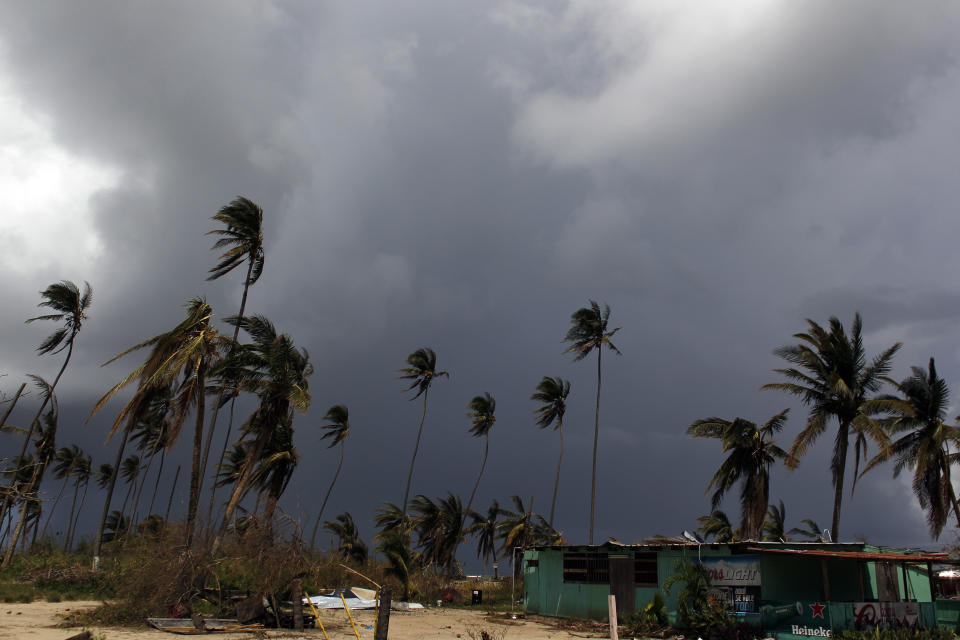 More storm clouds move in after Hurricane Maria in Loiza, Puerto Rico. (Photo: RICARDO ARDUENGO/AFP via Getty Images)