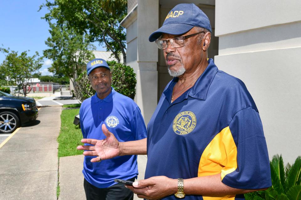 NAACP President Lewis Jennings, right, gives statement to the media Tuesday following the announcement that three Crestview Police officers were indicted for the October 2021 death of Calvin Wilks, Jr., who died hours after being tased during an incident with the officers. At left is Leroy Kelley, also with the NAACP.