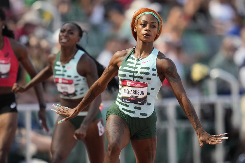 FILE - Sha'Carri Richardson wins her heat in the women's 100 meter preliminary race during the U.S. track and field championships in Eugene, Ore., Thursday, July 6, 2023. (AP Photo/Ashley Lanis, File)