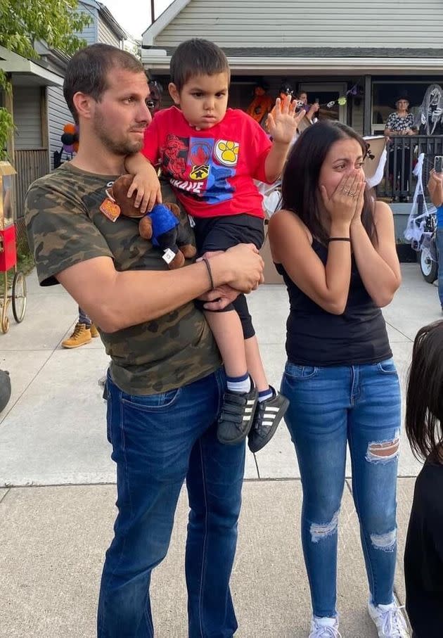 Alex's parents Nick (left) and Kira (right) were overwhelmed by the parade. (Photo: Paula Anderson)