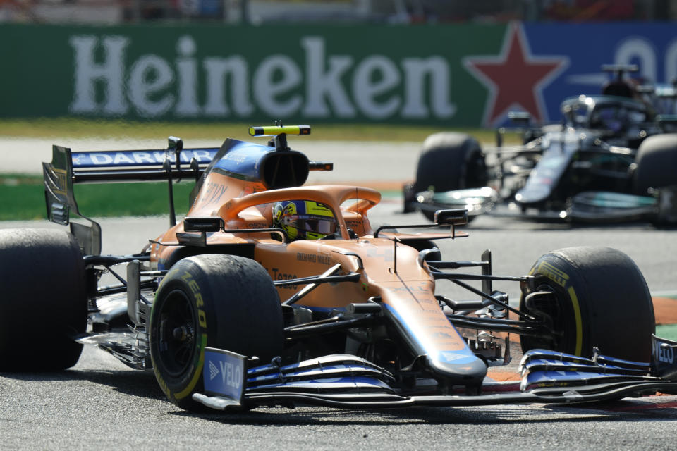 Mclaren driver Lando Norris of Britain steers his car during the Italian Formula One Grand Prix, at Monza racetrack, in Monza, Italy, Sunday, Sept.12, 2021. (AP Photo/Luca Bruno)