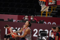 France's Gabby Williams shoots during a women's basketball practice at the 2020 Summer Olympics, Saturday, July 24, 2021, in Saitama, Japan. (AP Photo/Charlie Neibergall)