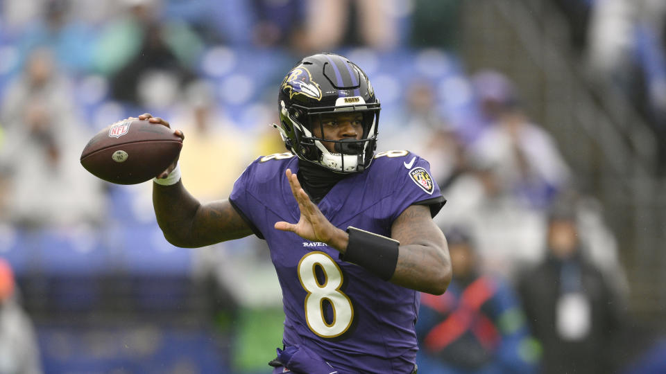 Lamar Jackson is looking to keep the Ravens on the winning track in Week 15. (AP Photo/Nick Wass)