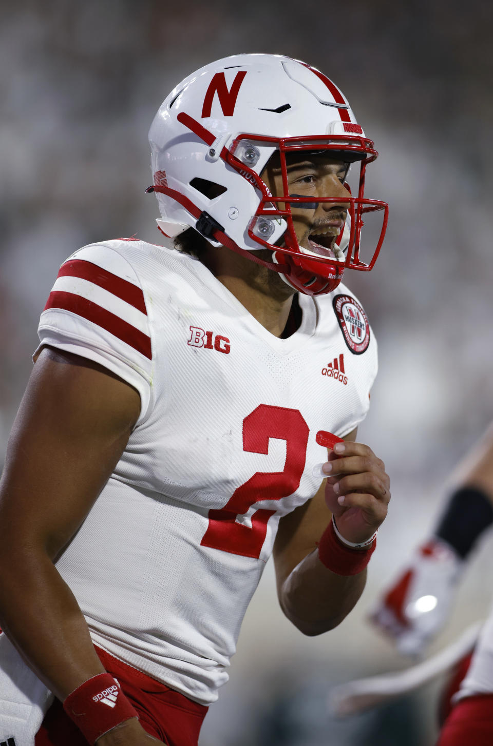 Nebraska quarterback Adrian Martinez celebrates his rushing touchdown against Michigan State during the second quarter of an NCAA college football game, Saturday, Sept. 25, 2021, in East Lansing, Mich. (AP Photo/Al Goldis)