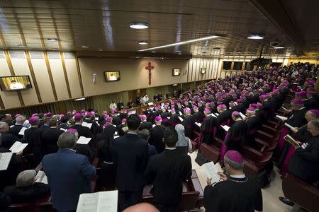 Pope Francis speaks during the opening session of an Italian Episcopal Conference meeting at the Vatican City, May 18, 2015. REUTERS/Osservatore Romano