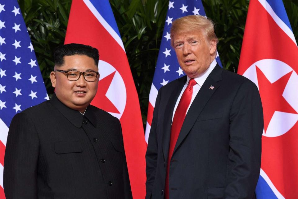 PHOTO: U.S. President Donald Trump meets with North Korea's leader Kim Jong Un at the start of their historic US-North Korea summit, at the Capella Hotel on Sentosa island in Singapore on June 12, 2018. (Saul Loeb/AFP via Getty Images)