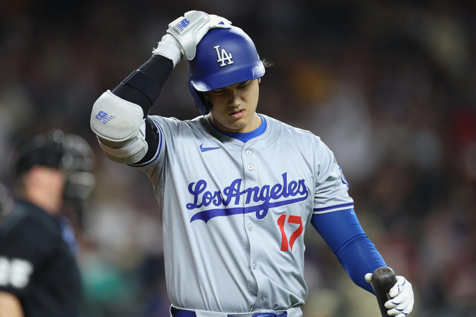 PHOENIX, ARIZONA - APRIL 30: Shohei Ohtani #17 of the Los Angeles Dodgers reacts after striking out against the Arizona Diamondbacks during the seventh inning of the MLB game at Chase Field on April 30, 2024 in Phoenix, Arizona. (Photo by Christian Petersen/Getty Images)