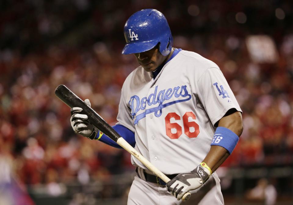 El jardinero de los Dondgers de Los Ángeles Yasiel Puig reveló como era su camino rumbo a EEUU. (Foto de AP/Charles Rex Arbogast)