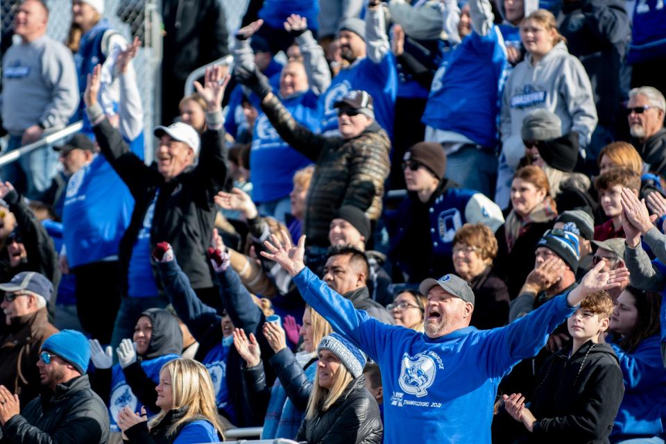 Quakertown fans cheer from the stands during the annual Thanksgiving game against Pennridge at Helman Field in Perkasie on Thursday, November 25, 2021. The Panthers shutout the Rams 21-0.