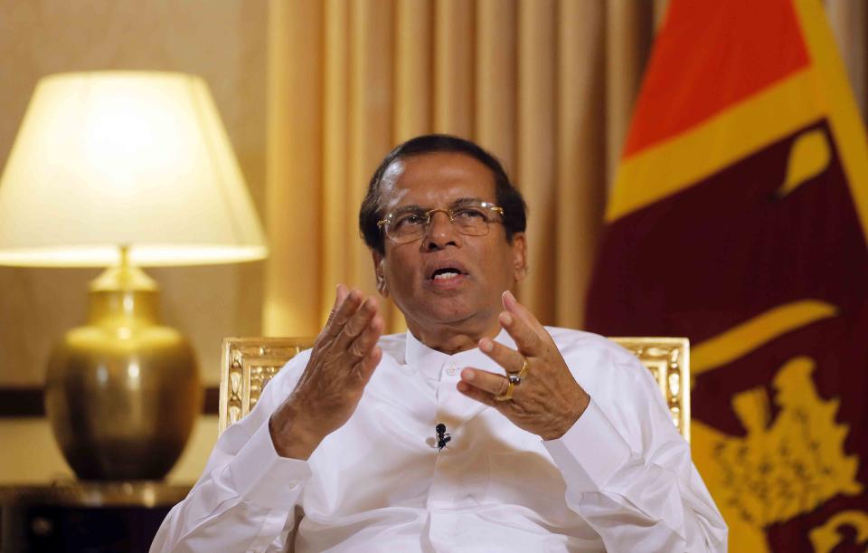 FILE- Sri Lankan President Maithripala Sirisena speaks during an interview with the Associated Press at his residence in Colombo, Sri Lanka, Tuesday, May 7, 2019. A Sri Lankan court has on Friday, Sept. 16, 2022, issued a summons ordering the ex-president to appear in a case alleging he failed to prevent suicide bomb attacks in 2019 that killed nearly 270 people. (AP Photo/Eranga Jayawardena)