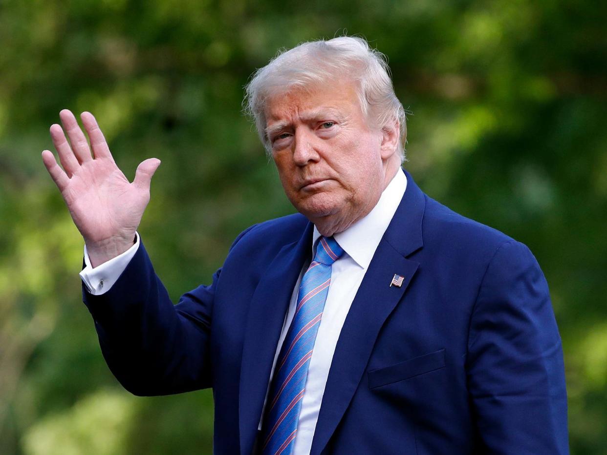 Donald Trump walks on the South Lawn of the White House on Sunday 14 June 2020: Patrick Semansky/AP