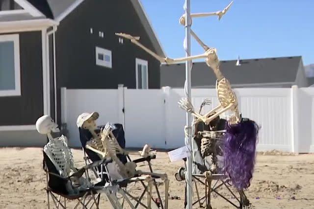 <p>FOX 32 Chicago/YouTube</p> City officials of Grantsville, Utah tell local to take down his cheeky skeleton display.