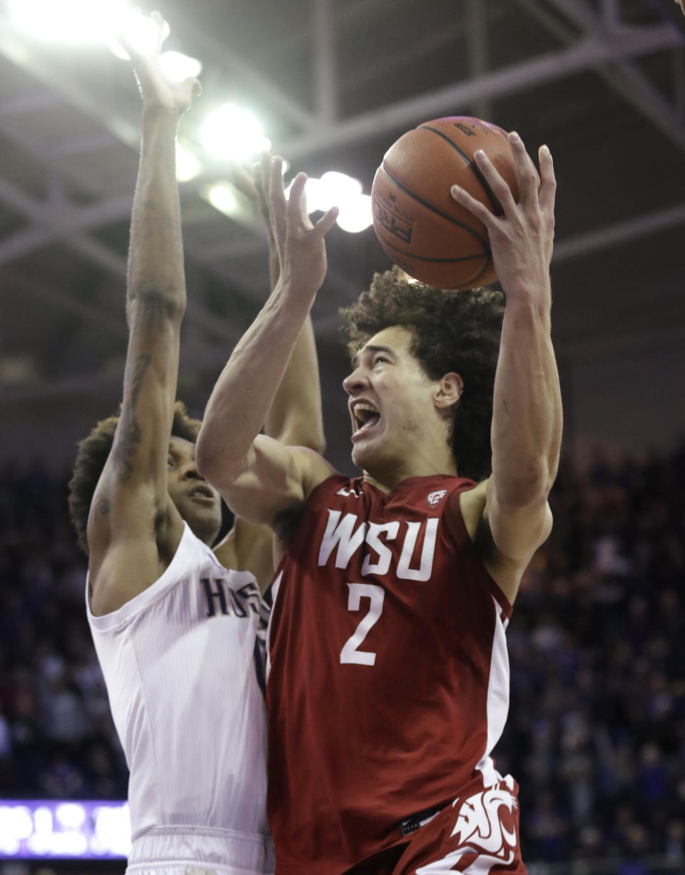 Washington State's CJ Elleby shoots during the second half of the team's NCAA college basketball game against Washington on Friday, Feb. 28, 2020, in Seattle. Washington State won 78-74. (AP Photo/Elaine Thompson)