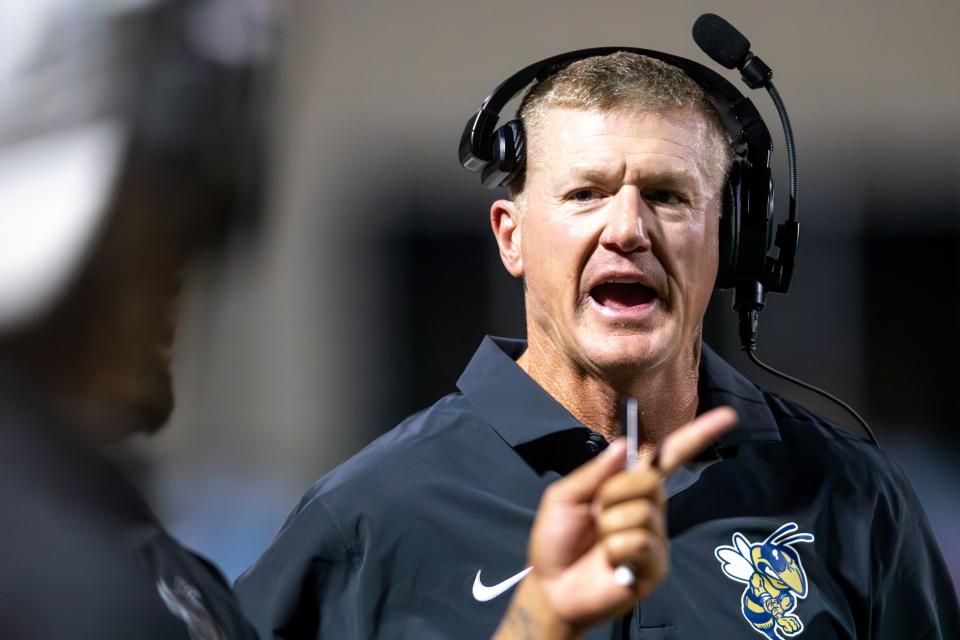 Kingfisher Coach Jeff Myers stands on the sidelines during a high school football game between Kingfisher High School and Clinton High School in Kingfisher on Friday, Aug. 25, 2023.