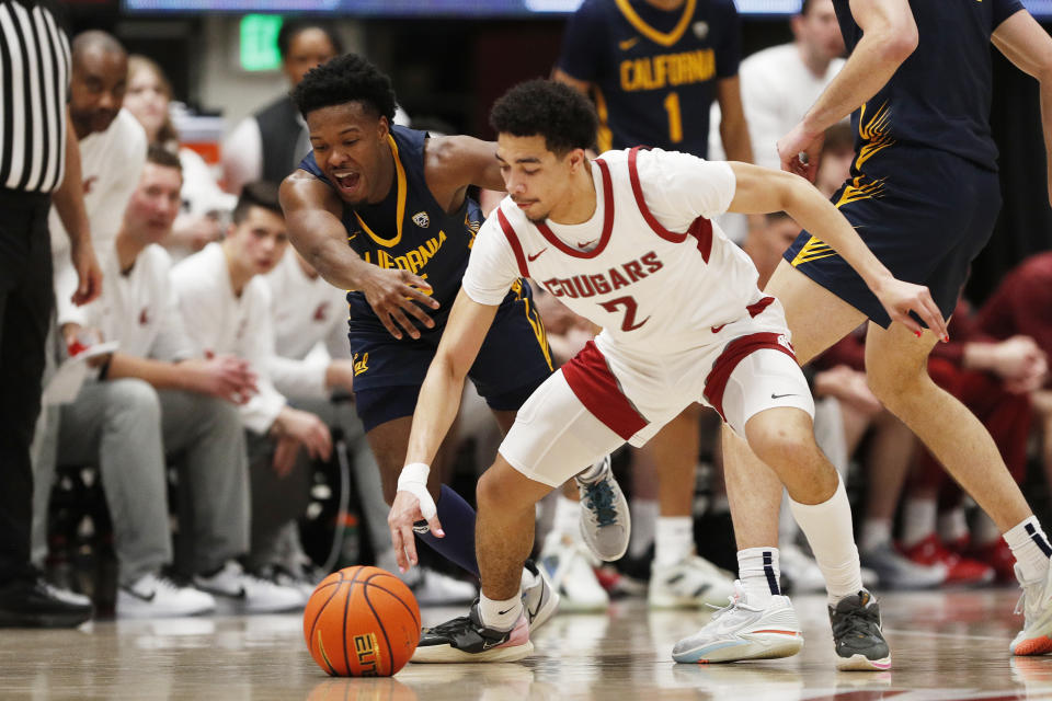 California guard Jalen Cone, left, and Washington State guard Myles Rice (2) go after the ball during the first half of an NCAA college basketball game Thursday, Feb. 15, 2024, in Pullman, Wash. (AP Photo/Young Kwak)