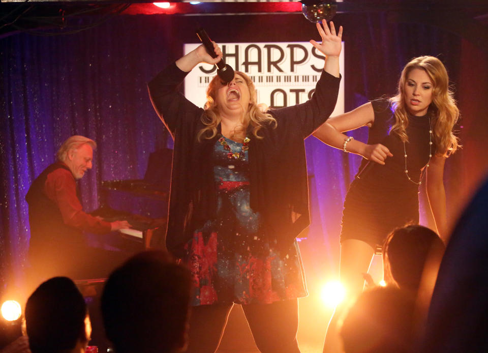 This image released by ABC shows Rebel Wilson, center, and Kate Jenkinson in a scene from "Super Fun Night," premiering Wednesday, Oct. 2, at 9:30 p.m. EST on ABC. (AP Photo/ABC, Gilles Mingasson)