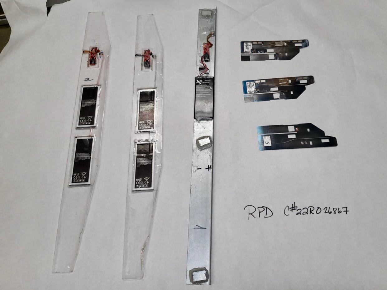 Skimming devices that were found by police attached to three different ATMs