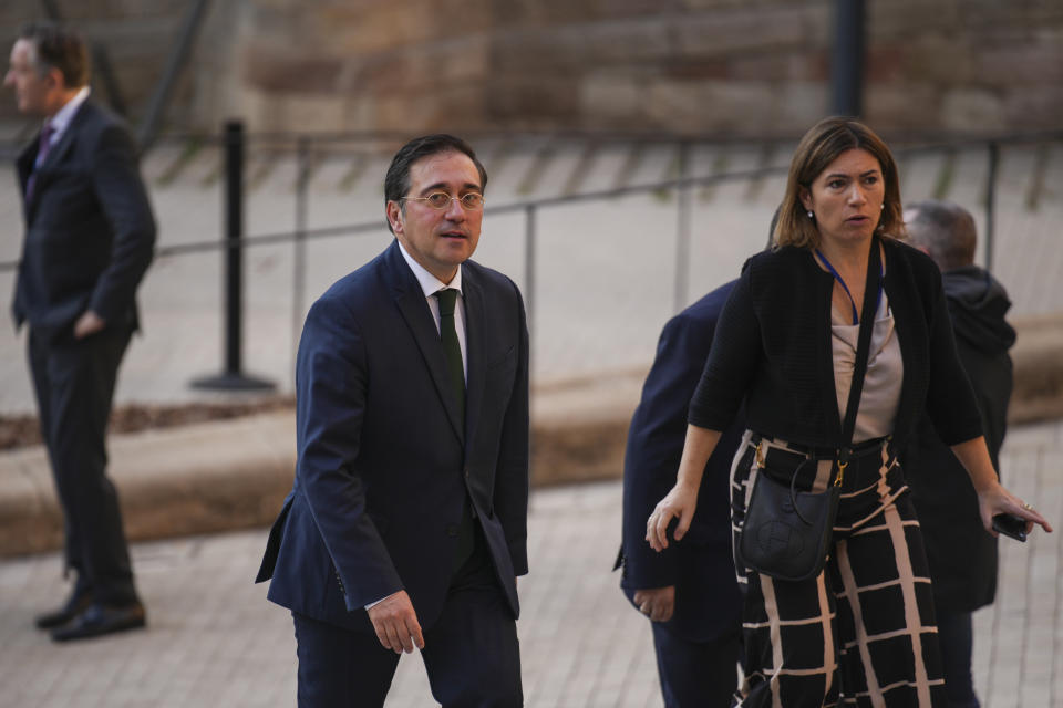 Spain's Foreign Minister Jose Manuel Albares, center, arrives at the Union for the Mediterranean event in Barcelona, Spain, Monday, Nov. 27, 2023. Delegations from the European Union member states and from Middle East and northern Africa countries are meeting Monday in Barcelona, Spain, to discuss the crisis in Gaza where a fragile pause in fighting is set to expire. Forty-two delegations will gather at the Union for the Mediterranean event with many represented by their foreign ministers. Israel is not attending. (AP Photo/Emilio Morenatti)