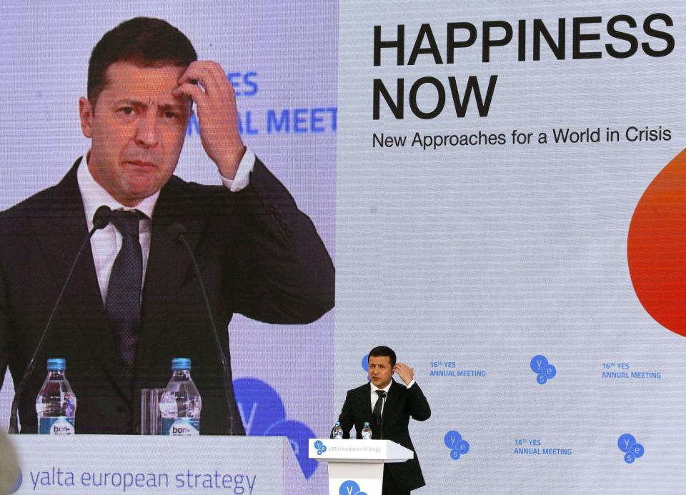 FILE - In this file photo taken on Friday, Sept. 13, 2019, Ukrainian President Volodymyr Zelenskiy address the 16th Yalta European Strategy (YES) annual meeting entitled "Happiness Now. New Approaches for a World in Crisis" at the Mystetsky Arsenal Art Center in Kyiv, Ukraine. Barely 100 days into his tenure Ukrainian President Volodymyr Zelenskiy finds himself in an unexpected position _ having to strike a balancing act with Ukraine's staunch ally, the United States. (AP Photo/Efrem Lukatsky, File)