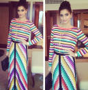 Sporting a clean high updo and a cool metallic element to her smokey eyes.Image:Instagram.com/Sonamkapoor