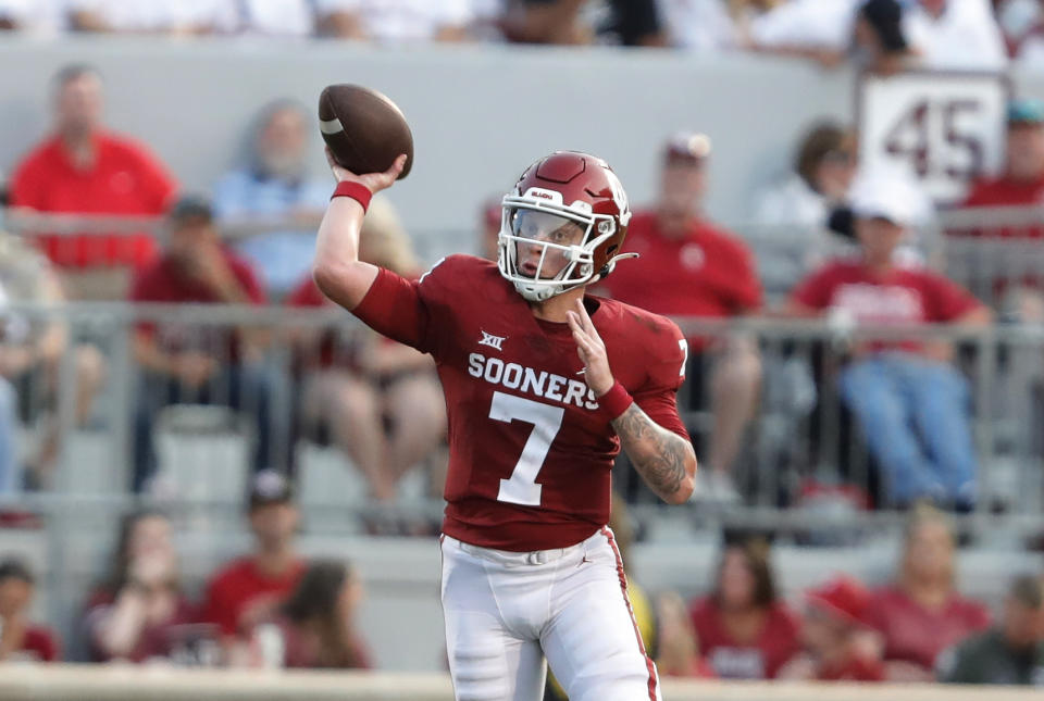 Oklahoma quarterback Spencer Rattler passes the ball against Western Carolina during the first half of an NCAA college football game Saturday, Sept. 11, 2021, in Norman, Okla. (AP Photo/Alonzo Adams)