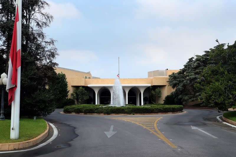 Lebanese national flags fly at half-mast outside the presidential palace as Lebanon marks the two-year anniversary of the August 2020 Beirut port explosion, in Baabda