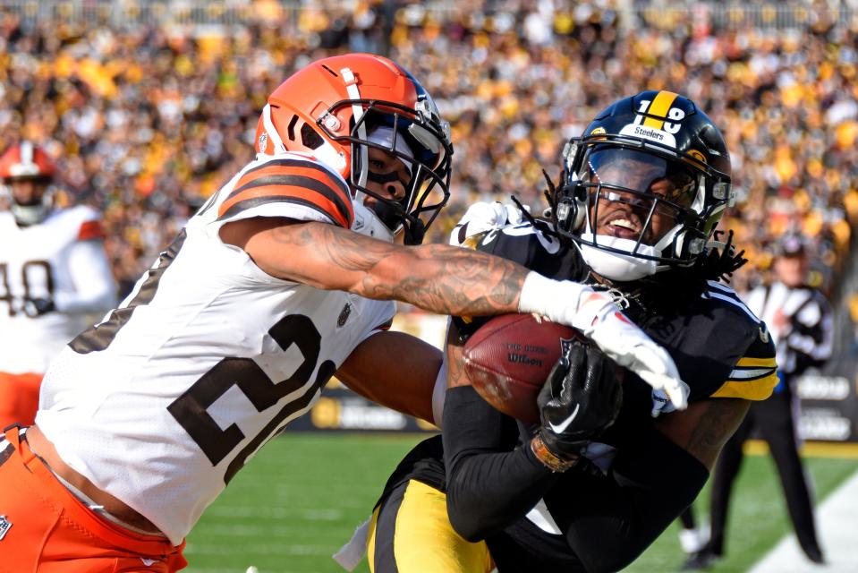 Browns cornerback Greg Newsome II breaks up a pass intended for Steelers wide receiver Diontae Johnson in the end zone during the first half in Pittsburgh, Sunday, Jan. 8, 2023.