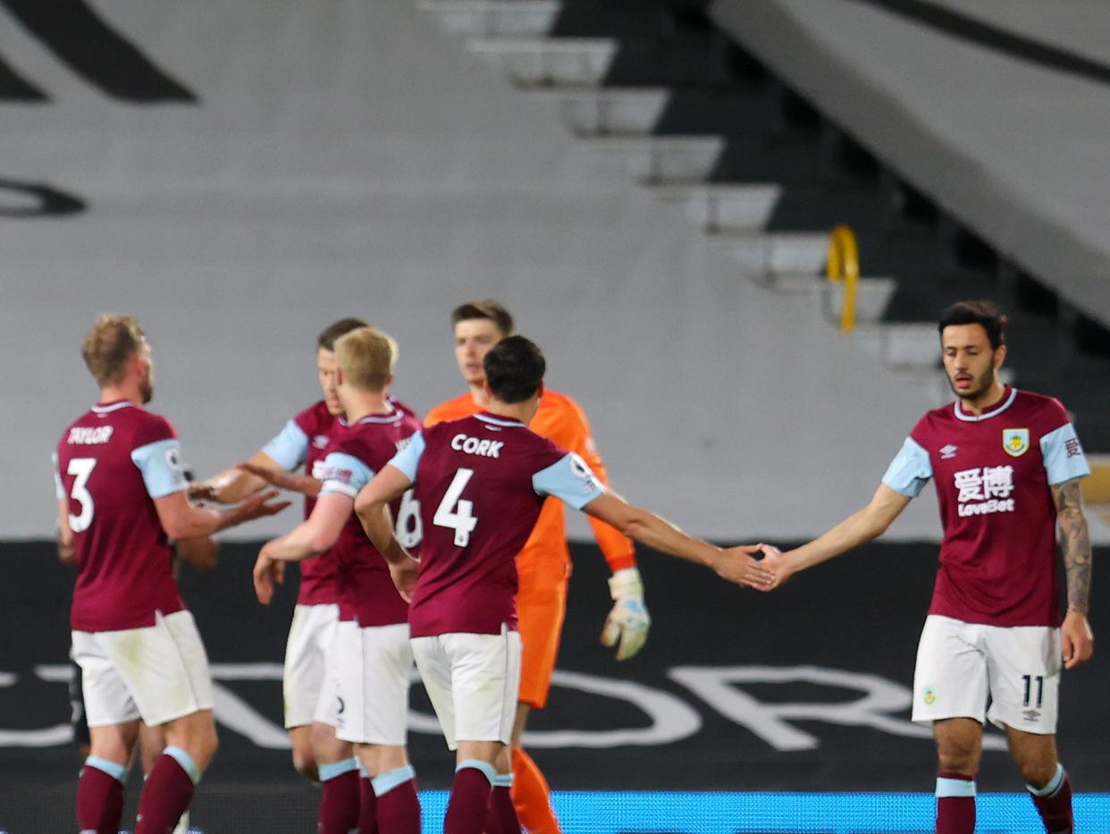 Burnley players celebrate their win over Fulham last time out (Getty Images)