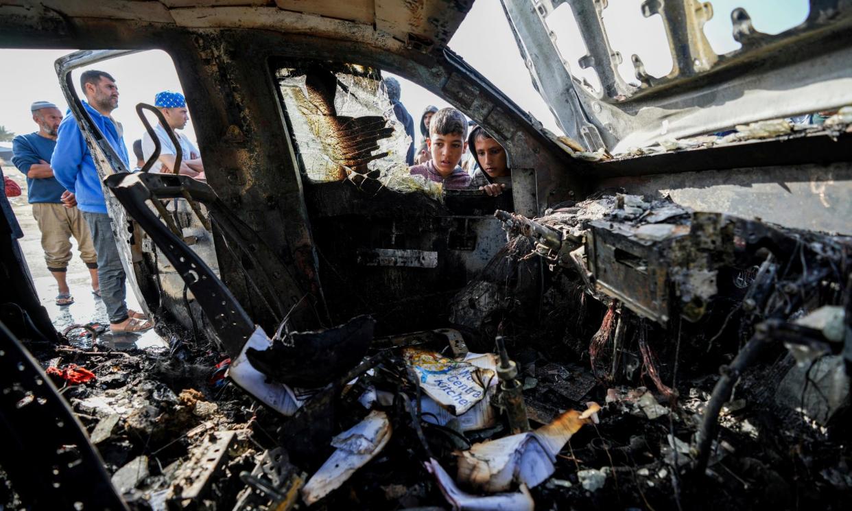 <span>Seven people were killed in Deir al-Balah when Israeli missiles struck a World Central Kitchen convoy.</span><span>Photograph: Abdel Kareem Hana/AP</span>