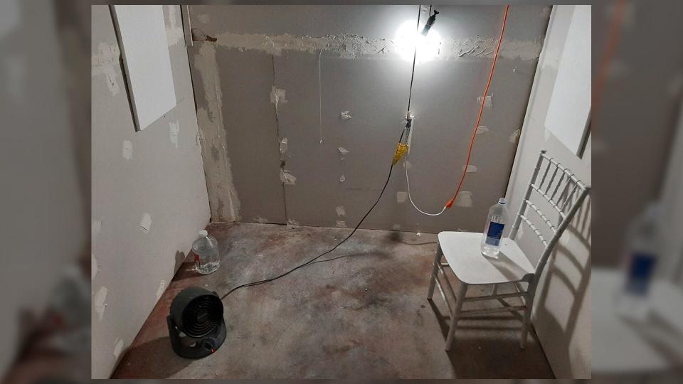 This undated photo provided by the Federal Bureau of Investigation's Portland Field Office shows the interior of a makeshift cinderblock cell in Klamath Falls, Ore., allegedly used by Negasi Zuberi. The FBI said Wednesday, Aug. 2, 2023, that Zuberi, 29, who posed as an undercover police officer kidnapped a woman in Seattle, drove her hundreds of miles to his home in Oregon, and kept her in the cell from which she eventually escaped and found help. Zuberi who was arrested faces a federal interstate kidnapping charge, and authorities said they are looking for additional victims after linking him to sexual assaults in at least four more states.