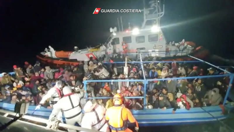 Italian coastguard rescue more than 300 migrants from boat in distress off Lampedusa