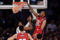 Florida Atlantic's Alijah Martin (15) shoots over Kansas State's David N'Guessan (3) in the first half of an Elite 8 college basketball game in the NCAA Tournament's East Region final, Saturday, March 25, 2023, in New York. (AP Photo/Adam Hunger)