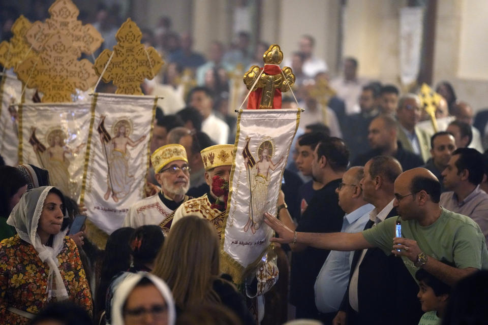 Egyptian Coptic Orthodox worshippers attend Mass on the eve of Christ's resurrection at St. Anthony Coptic Orthodox Church in Cairo, Saturday, April 15, 2023. (AP Photo/Amr Nabil)