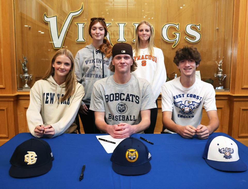 East Bridgewater senior Ray McNaught signs his letter of intent to play baseball at Quinnipiac University in a ceremony at East Bridgewater Junior/Senior High School on Wednesday, Nov. 9, 2022. McNaught, was joined by his parents (Dave and Meghan), siblings (David, Kaitlyn, Elizabeth and Emily), grandmother (Anna McNaught) with teammates and coaches. 