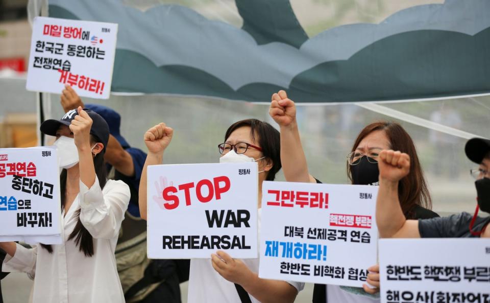 Protesters hold a rally against the South Korea-US military exercise in central Seoul (Xinhua/Shutterstock)