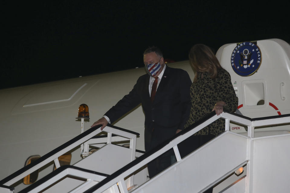 U.S. Secretary of State Mike Pompeo, left, and his wife Susan, arrive in the northern city of Thessaloniki, Greece, Monday, Sept. 28, 2020. Secretary Pompeo is on a two-day visit to Greece during which he will meet Greek Prime Minister Kyriakos Mitsotakis and Foreign Minister Nikos Dendias, and he will visit the Naval Support Activity base of Souda on the island of Crete. (AP Photo/Giannis Papanikos, Pool)