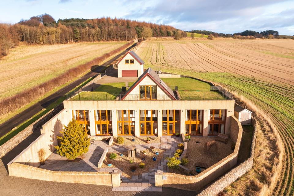 This spacious light-filled house includes five bedrooms and offers views over the beautiful Fife countryside. 