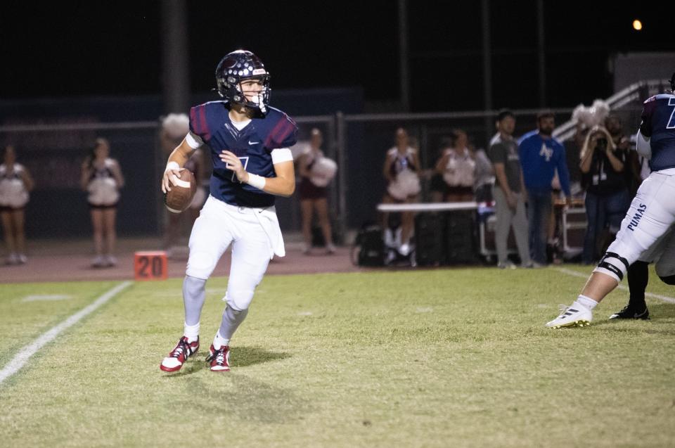 Pumas quarterback Diesel Taylor (7) runs the ball on Sept. 29, 2023 at Perry High School in Gilbert. 
Nicole Mullen/The Republic