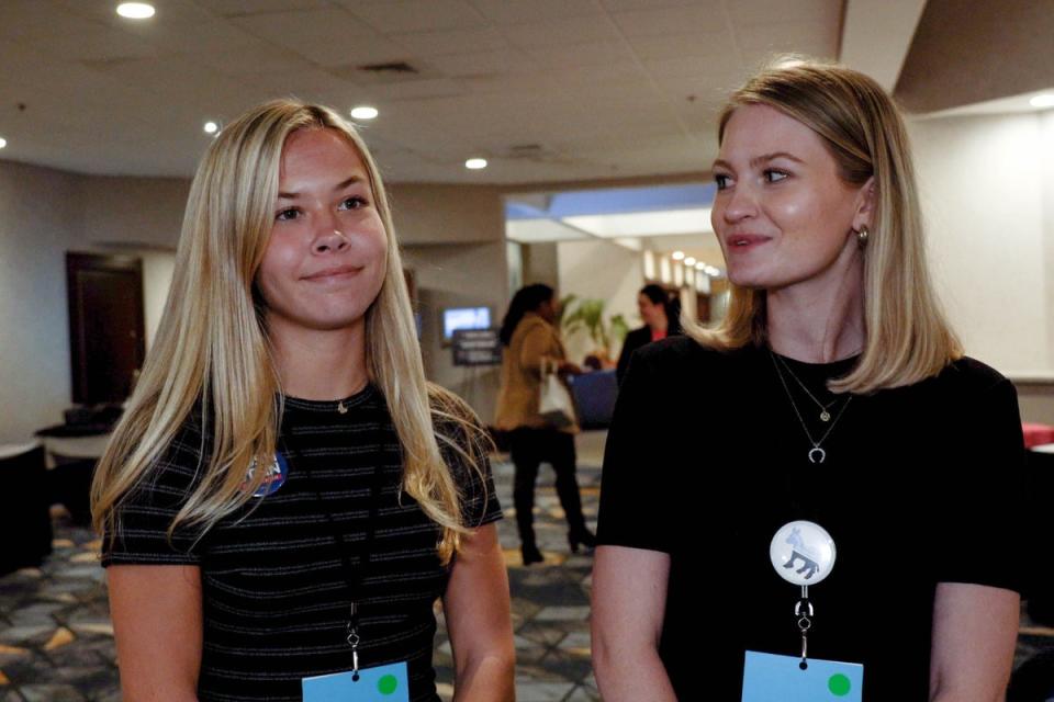 Sloan Duvall (left) and Mary Margaret Barbee (right) discuss the 2024 election at the Young Democrats of North Carolina convention (Julia Saqui)