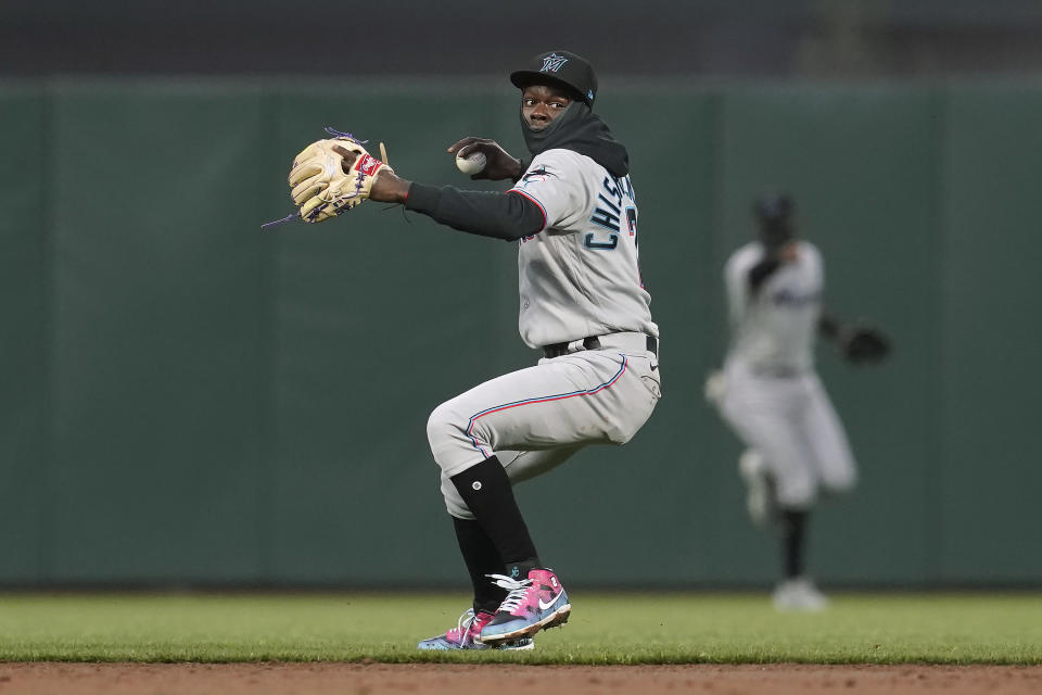 Miami Marlins second baseman Jazz Chisholm Jr. throws to first base for the out after fielding a grounder by San Francisco Giants' Mike Yastrzemski during the third inning of a baseball game in San Francisco, Thursday, April 22, 2021. (AP Photo/Jeff Chiu)