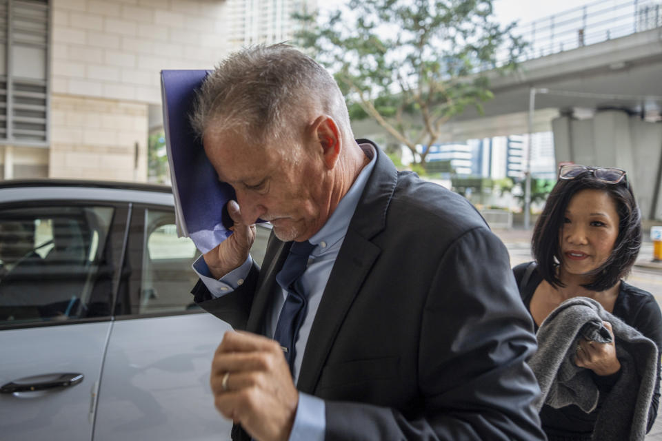Washington state Sen. Jeff Wilson arrives at West Kowloon Magistrates Courts in Hong Kong, Monday, Oct. 30, 2023. A Hong Kong court dismissed a gun charge Monday against the Washington state senator who had been arrested after he carried a gun into the Chinese territory in what he called an “honest mistake.”(AP Photo/Vernon Yuen)